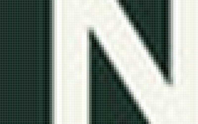 Delivered Spotify letter edge magnified into the same pixel blocks.